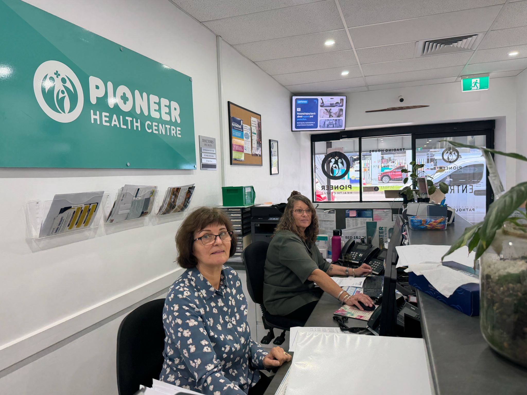 Pioneer Health Centre reception team at the front desk